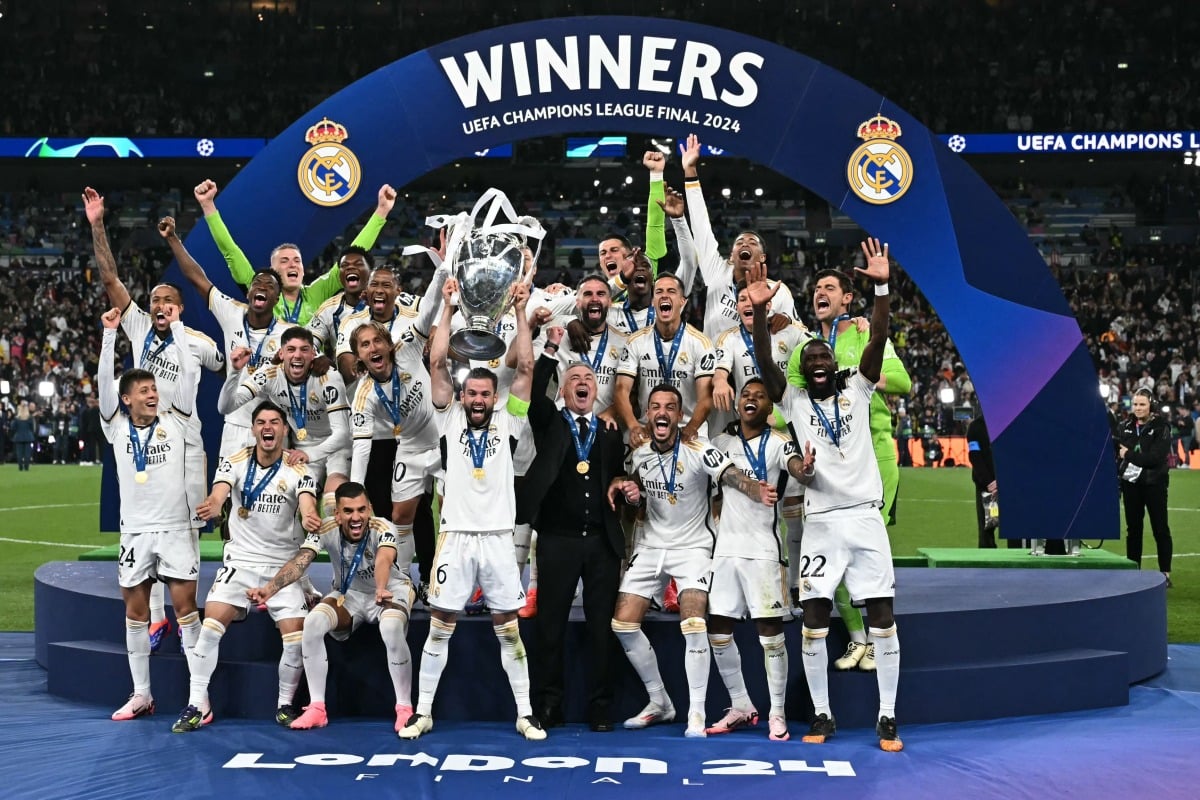 Real Madrid lifting the 2023/24 Champions League trophy